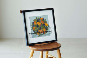 Bright pressed flower frame with orange and green color