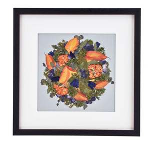 Bright pressed flower frame with orange and green color